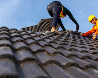 How Do Roofing Companies Work with Insurance Companies?