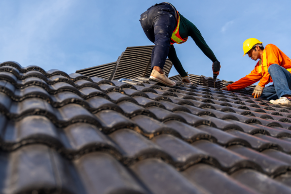 How Do Roofing Companies Work with Insurance Companies?